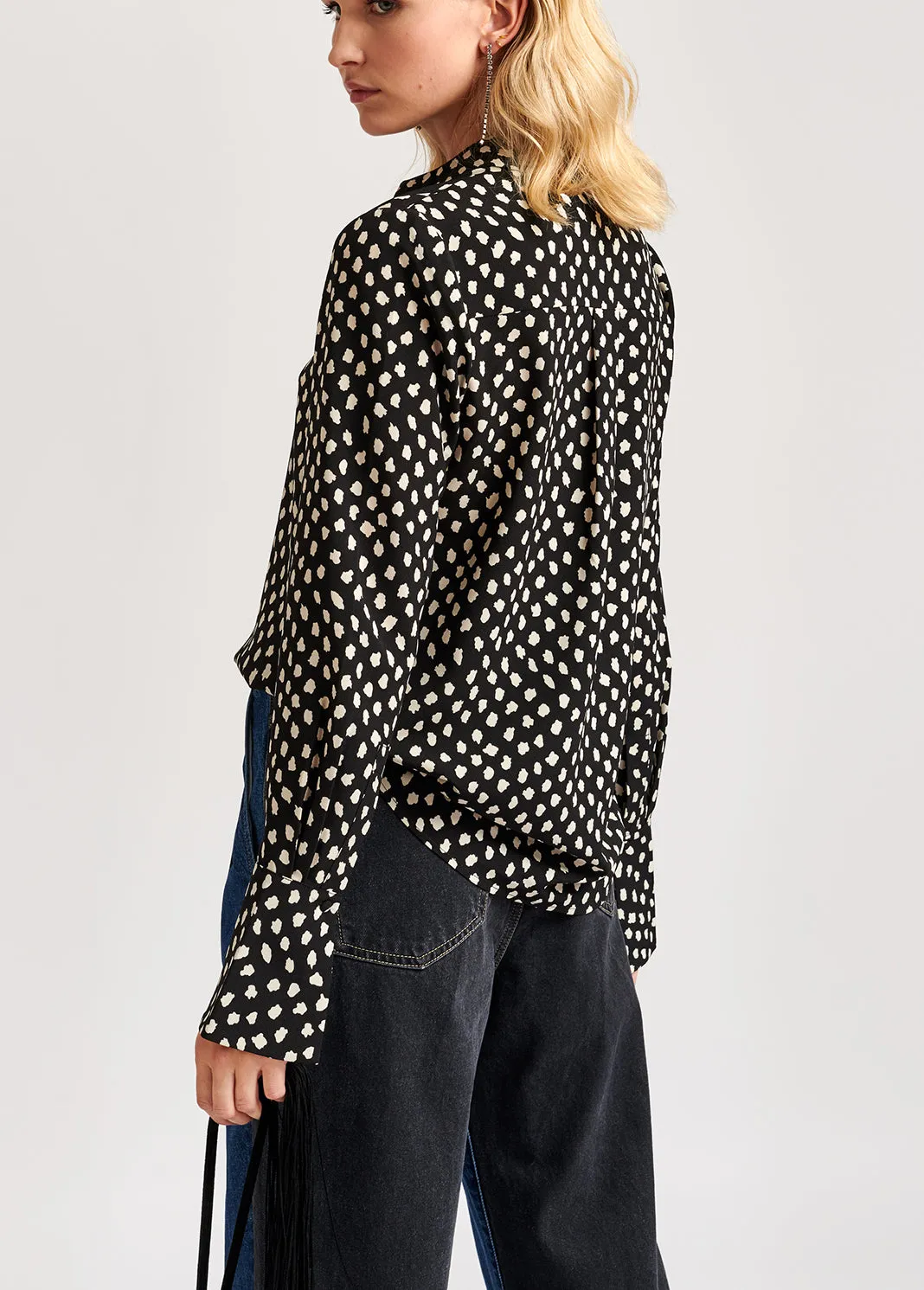 Black polka dot shirt