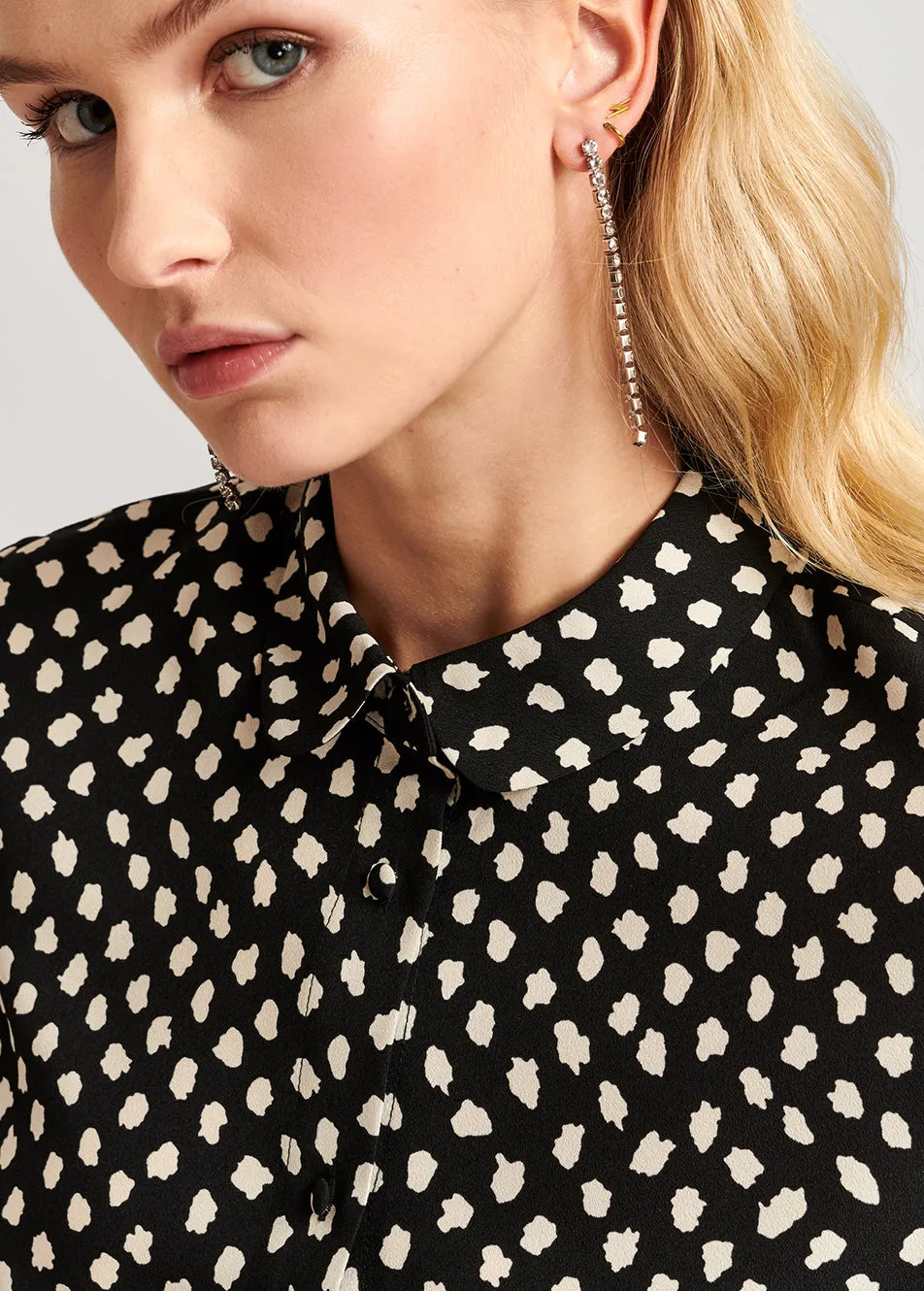 Black polka dot shirt